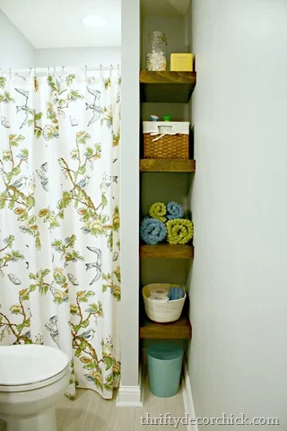 thick floating shelves in bathroom