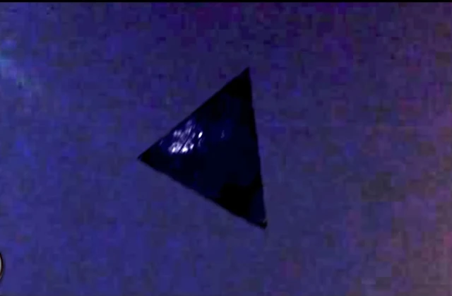 This os a Black Triangle shaped UFO over Chicago in Illinois.