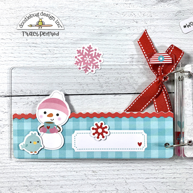 Winter scrapbook album with acrylic cover and snowman