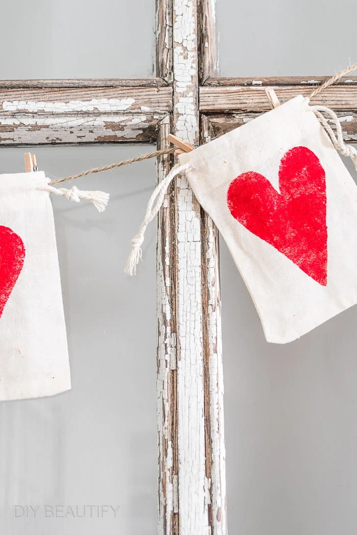 mini clothespins to secure drawstring bags to twine