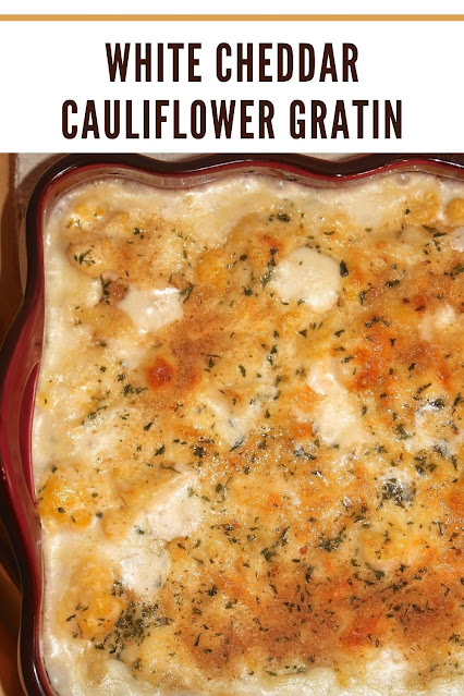 Top of baked white cheddar cauliflower gratin.