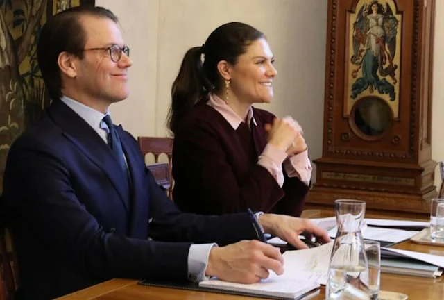 Crown Princess Victoria wore a burgundy jacket. Dulong Fine Jewelry butterfly earrings with piccolo pendants
