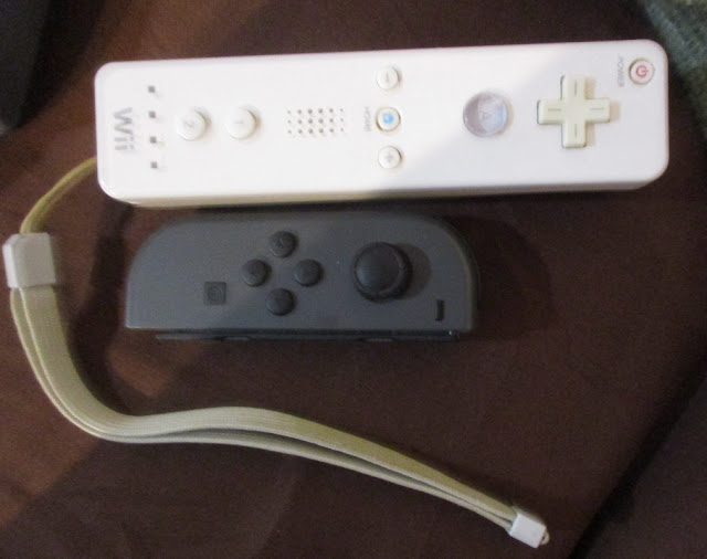 Nintendo Switch Joy-Con Wii Remote wrist strap size comparison side by side