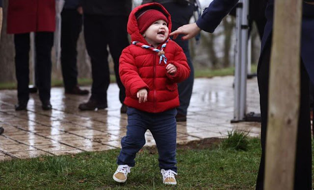 Princess Stephanie wore a blue Gibbsmoore coat by Burberry. Prince Charles wore a red puffer jacket by Petit Bateau