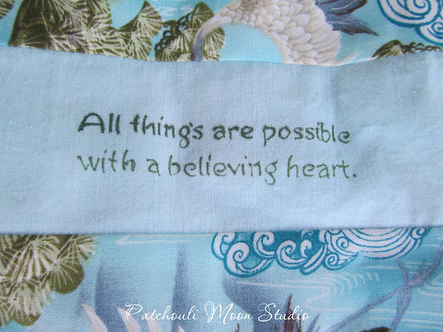 close up of quote on purse flap
