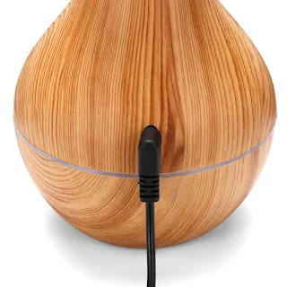 The ultra-quiet portable ultrasonic humidifier keeps your living space clean and properly moisturized Wood grain hown - store