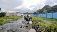 Jalan Berlubang bak Kubangan Kerbau di Panombean Panei