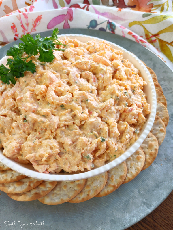 Southern Shrimp Dip! A party pleasing appetizer recipe with shrimp, cream cheese, Cajun seasoning and tons of flavor perfect on crackers.