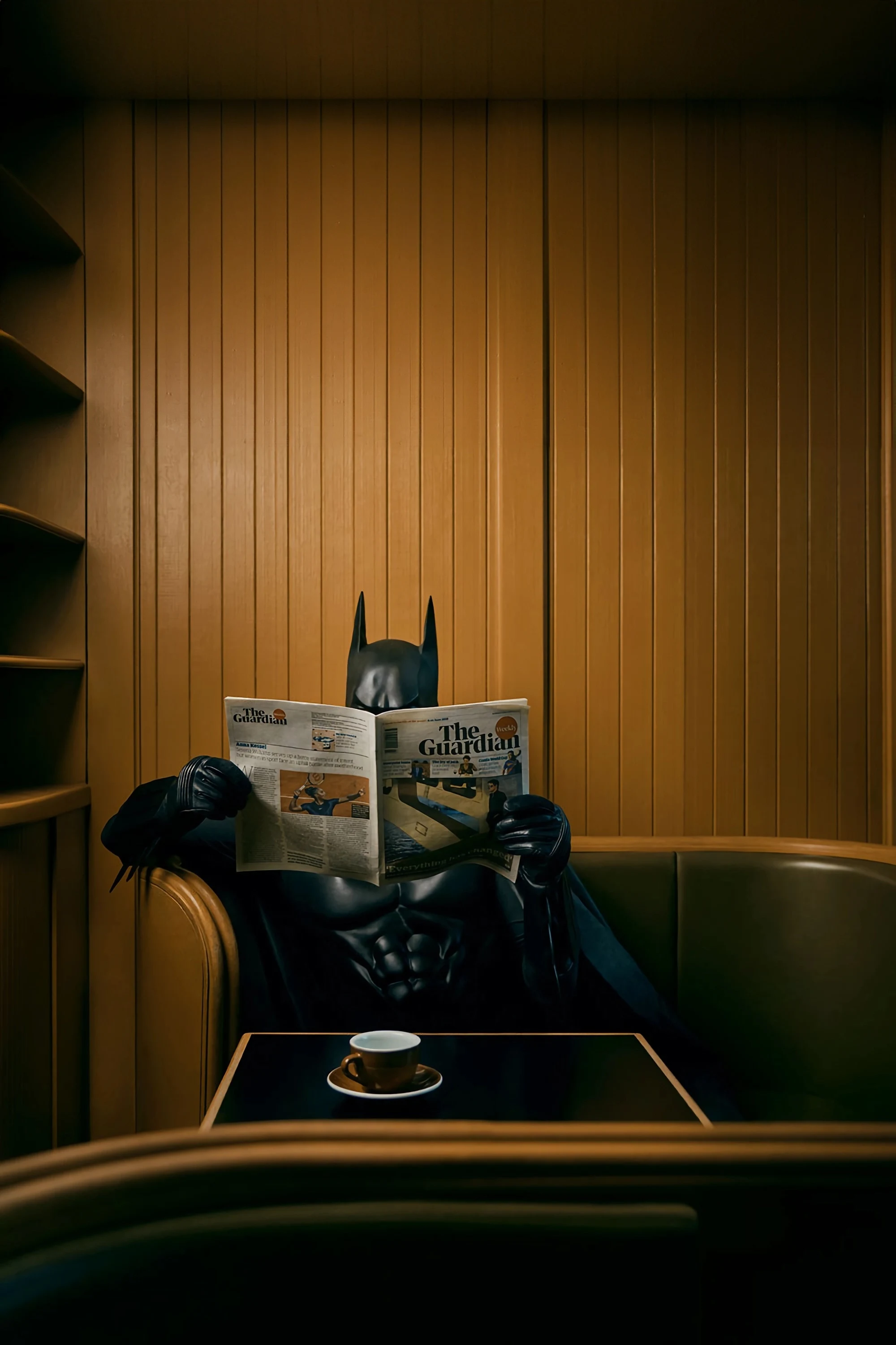 BATMAN READING NEWSPAPER