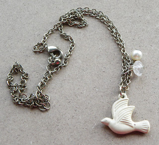 Charm dove necklace modern