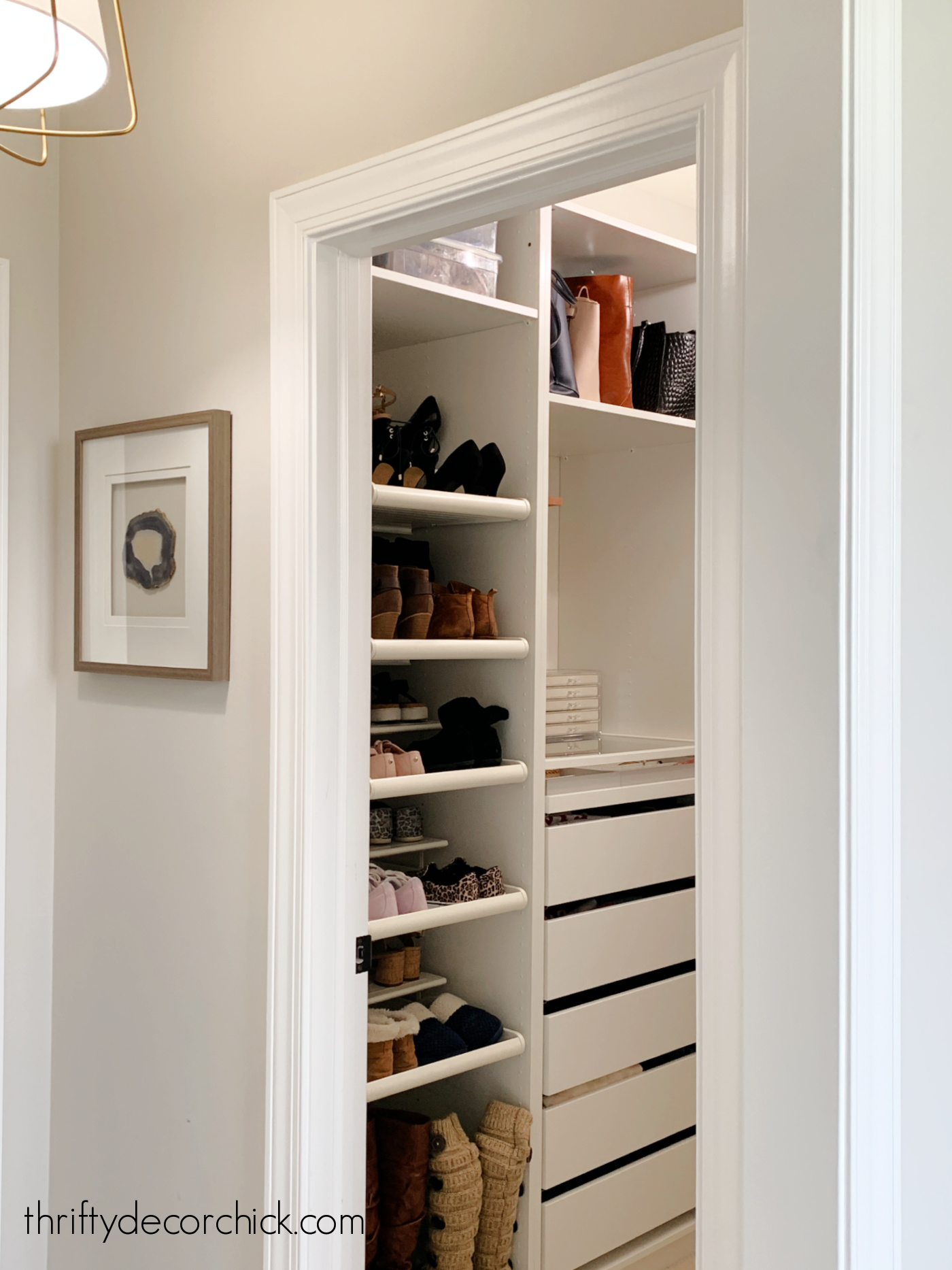 Large Walk In Closet With Tile Floor, Also Including Many Shelves