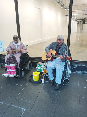 This " BUSKER COUPLE" both are above 80 years of age .