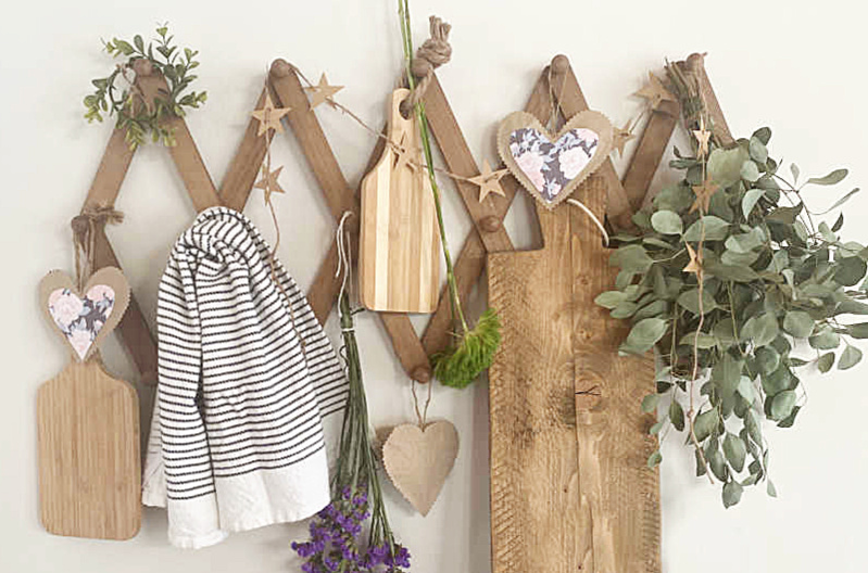 hook rack with hanging hearts and kitchen accessories