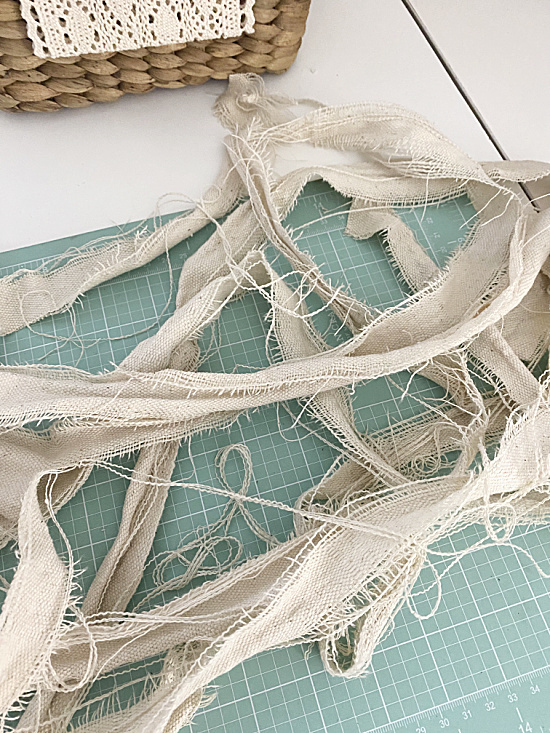 frayed strips of drop cloth fabric