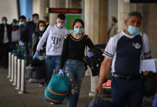 Cover Image Attribute: Romanian harvest workers heading to the U.K. wait in line to enter the airport in Bucharest on April 30, 2020/Source: Daniel Mihailescu, AFP - Getty Images