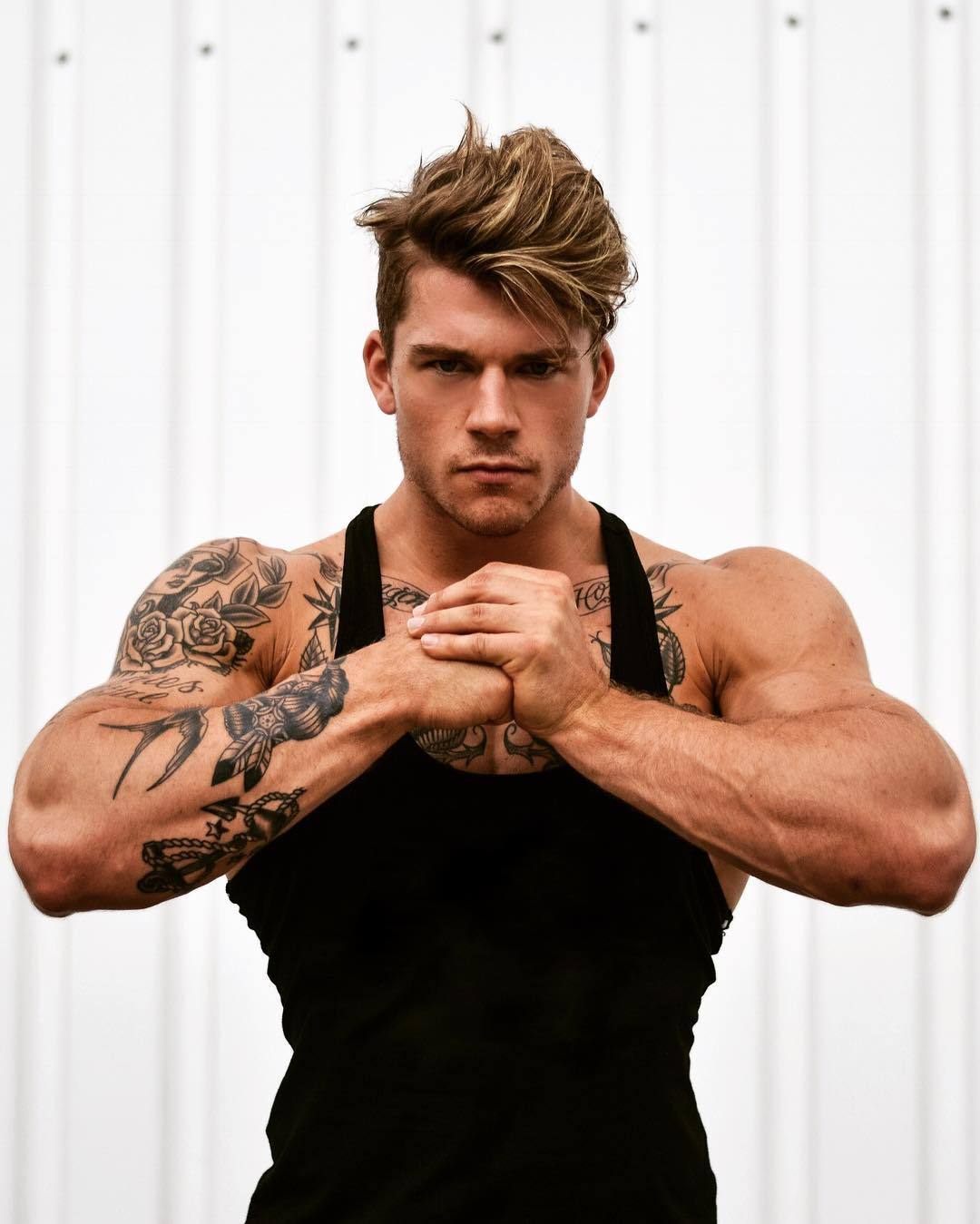 masculine-strong-tattoo-arm-alpha-male-stud