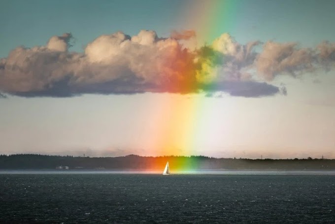 Photographer Captures Sailboat at Rainbow's End
