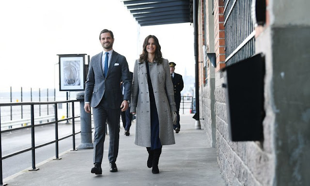Princess Sofia wore a double breasted checked coat, grey leather cuffs by 2nd Day. Navy sweater midi dress