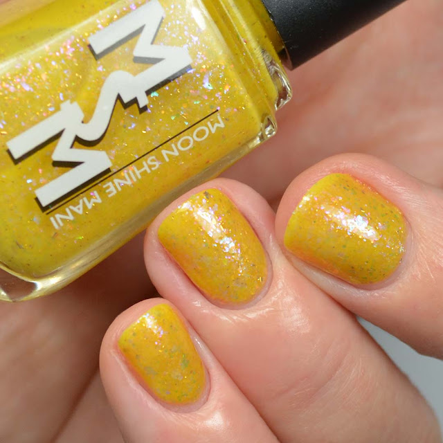 mustard nail polish with flakies swatch