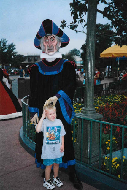 Kid Meeting Frollo From Hunchback of Notre Dame at Walt Disney World