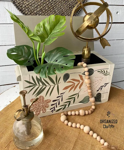 Photo of a thrifted wooden box upcycled with Dixie Belle Chalk Dried Sage and Drop Cloth Paint and Redesign with Prima Greenery House Decor Transfer.