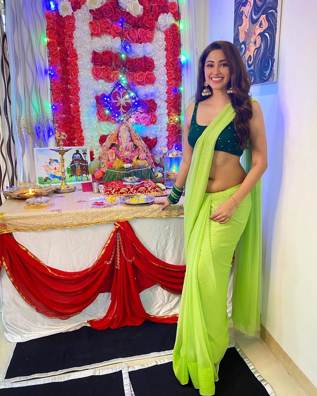 Eshanya Maheshwari's Neon Green Saree with Dark Green Velvet Blouse for Ganesh Chaturthi