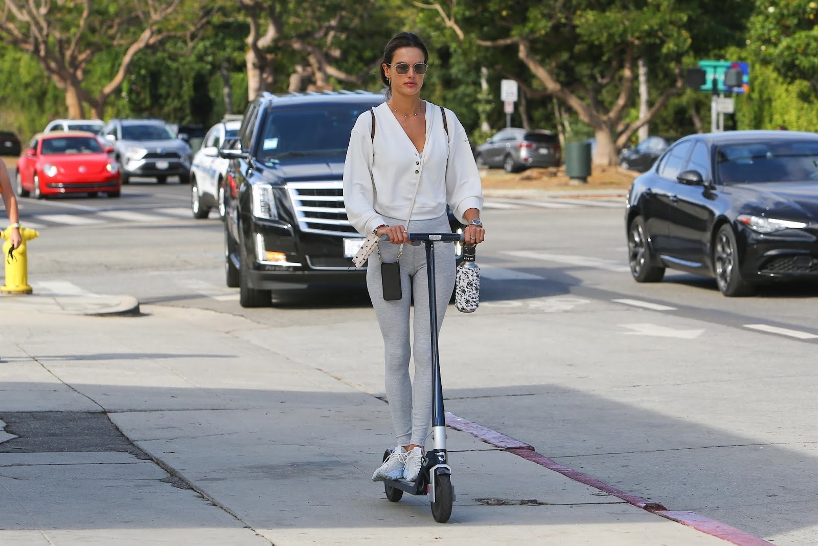 Alessandra Ambrosio Heads to the gym for her workout on a scooter in Brentwood