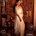 Pregnant Sonam Kapoor Flaunts her Baby-Bump draped in a white saree.