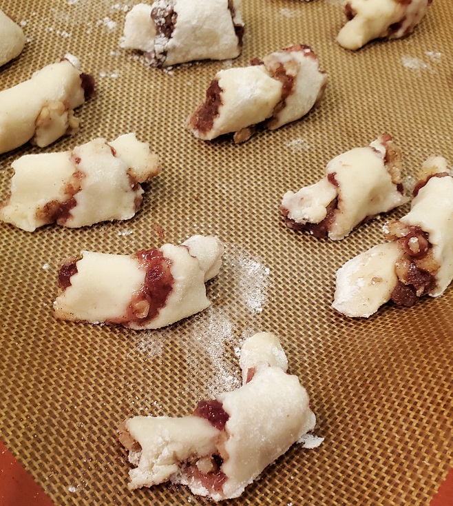 rugelach ready to bake filled with jam and nuts