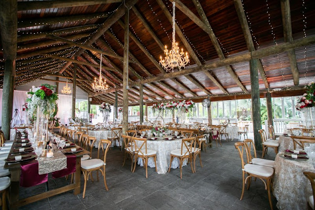 paradise cove reception tables with chandeliers