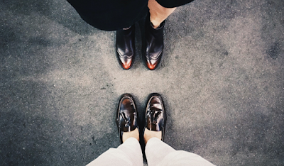 Two Persons Wearing Pairs of Tassel Shoe and Loafer shoe