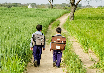 village boy going to school