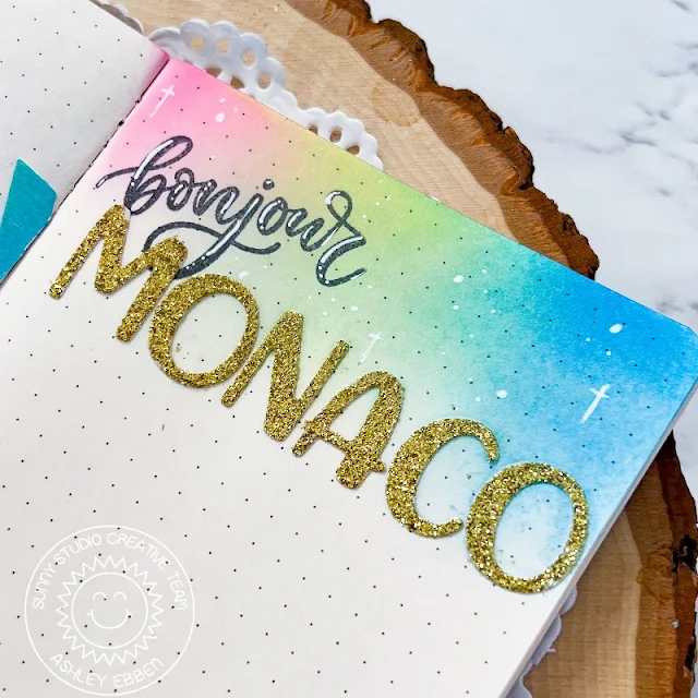 Sunny Studio Stamps: Paris Afternoon Travelers Notebook by Ashley Ebben (featuring Chloe Alphabet Dies, Bursting Heart Dies, Fluffy Clouds, Frilly Frame Dies)