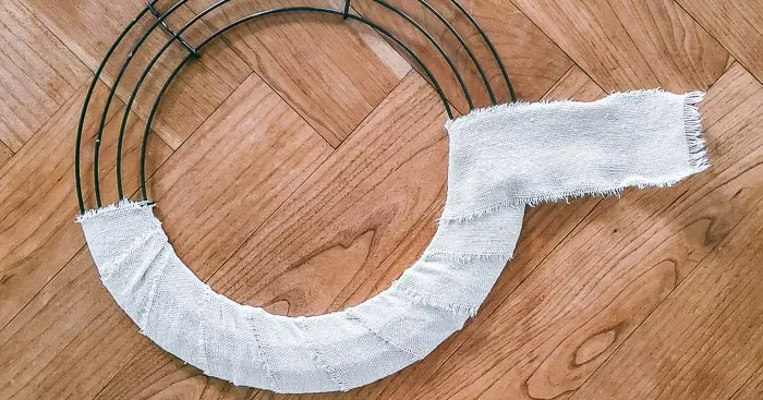 wrapping wire wreath form with drop cloth strips