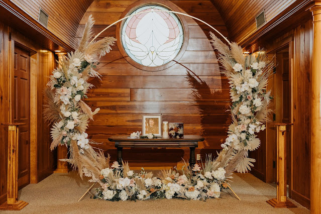 wedding arch with pampas grass