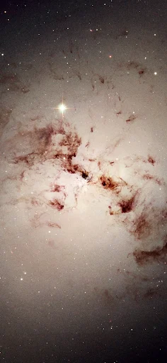 Hubble spies cosmic dust bunnies