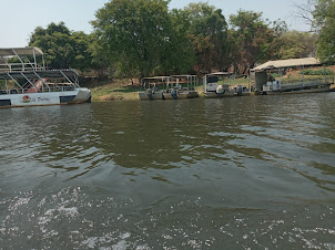 Boats parked along the Kasane coast of Botswana on the Chobe River