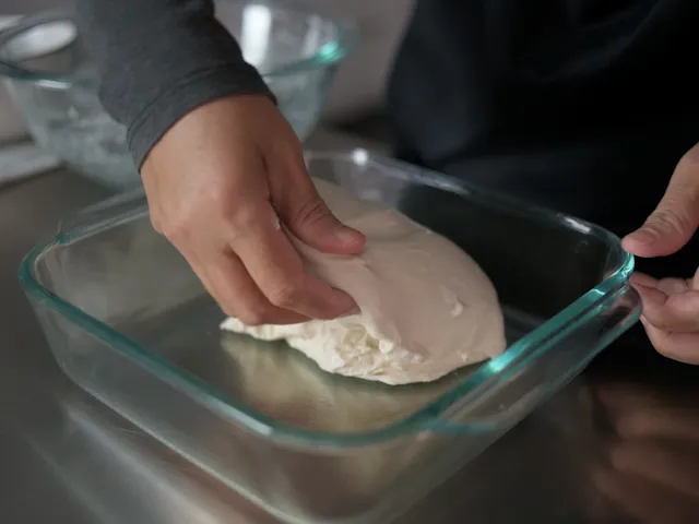 dough will spread itself in the glass container.