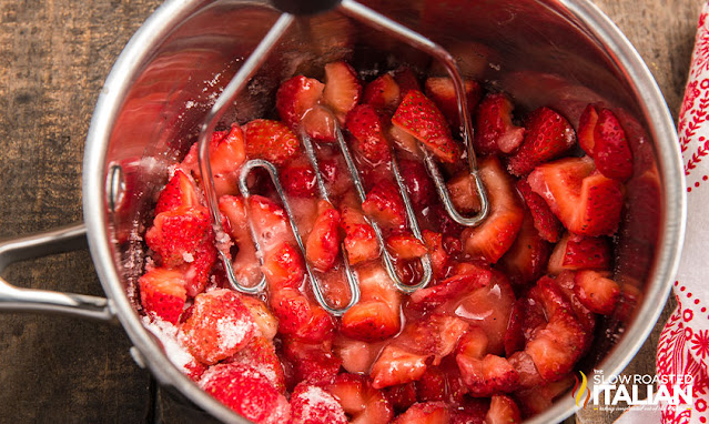 strawberries smashed in a pot
