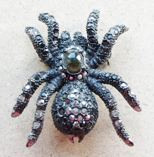 Black spider brooch with diamante