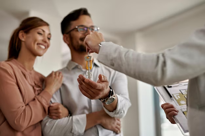 https://www.freepik.com/free-photo/closeup-real-estate-agent-giving-couple-keys-their-new-home_26345087.htm