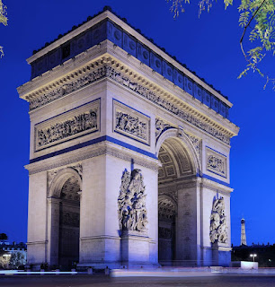 Historical and monumental building of Paris, Arc de Triomphe in the Champs-Élysées Avenue, street.