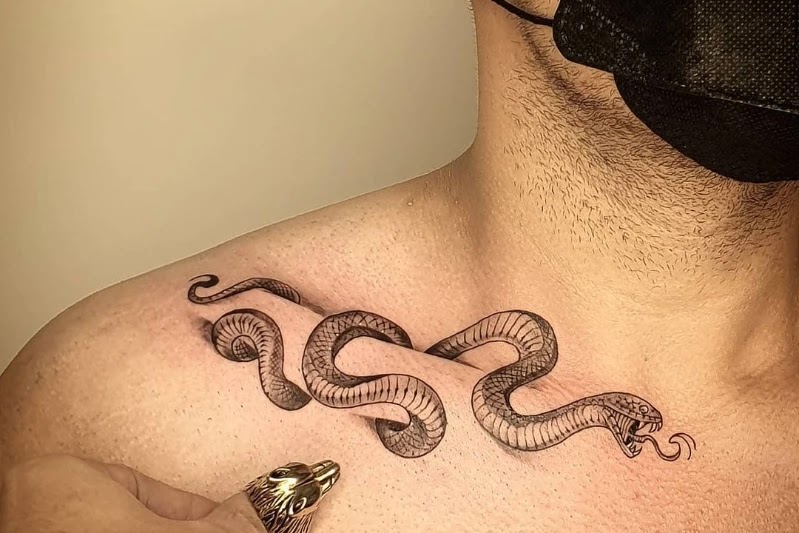 Beauty bone 3D snake tattoo, men.