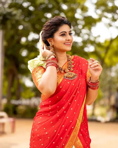 Actress Sneha latest photoshoot in half saree