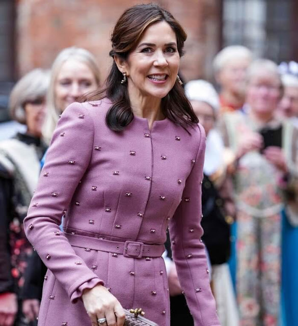 Crown Prince Frederik and Princess Benedikte. Crown Princess Mary wore a dusty pink coat dress. The iconic ruby set