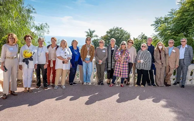 Princess Caroline of Hannover (Princess Caroline of Monaco) wore a camel zip-up suede biker jacket. high waisted wide leg jeans