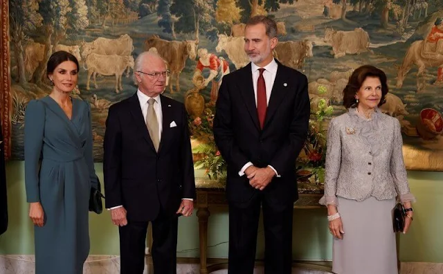 Queen Letizia wore a green Alessia dress by Cherubina. Crown Princess Victoria wore a flral skirt by Baum Und Pferdgarten