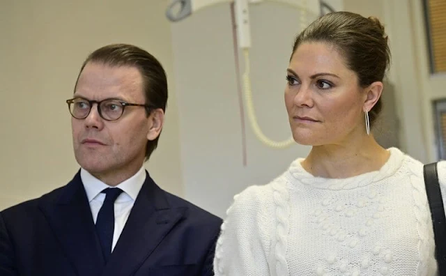 Crown Princess Victoria wore a merino cable knit sweater from & Other Stories. Alexandre de Paris large clip. Leather skirts