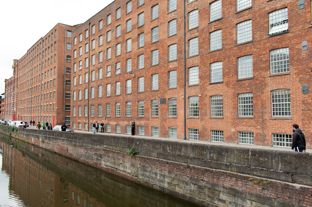 Mills at the side of a canal