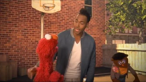 Sesame Street Episode 4505. Romeo Santos sings a song, the name of the song is Quiero Ser Tu Amigo,  we also see Elmo.